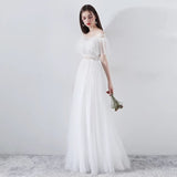 Boat neck white tulle wedding gown