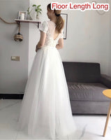 Short sleeve lace and tulle modest wedding dress