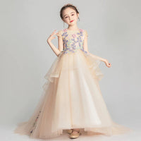 Embroidered little girl's champagne ball gown with train