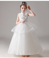 Little girl’s white ball gown sleeveless high neckline