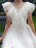 Short white tulle wedding gown
