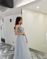 Off the shoulder sparkly grey prom dress with train