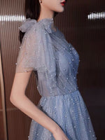 Blue tulle dress with pearls