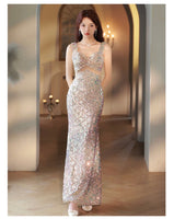 Sparkly champagne prom dress with bowknot tailing