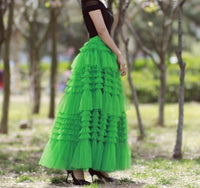 Long green skirt black tutu skirt white