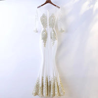 Long sleeve embroidered champagne mermaid dress