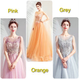 Orange Embroidered tailed prom dress