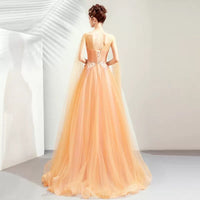 Orange Embroidered tailed prom dress